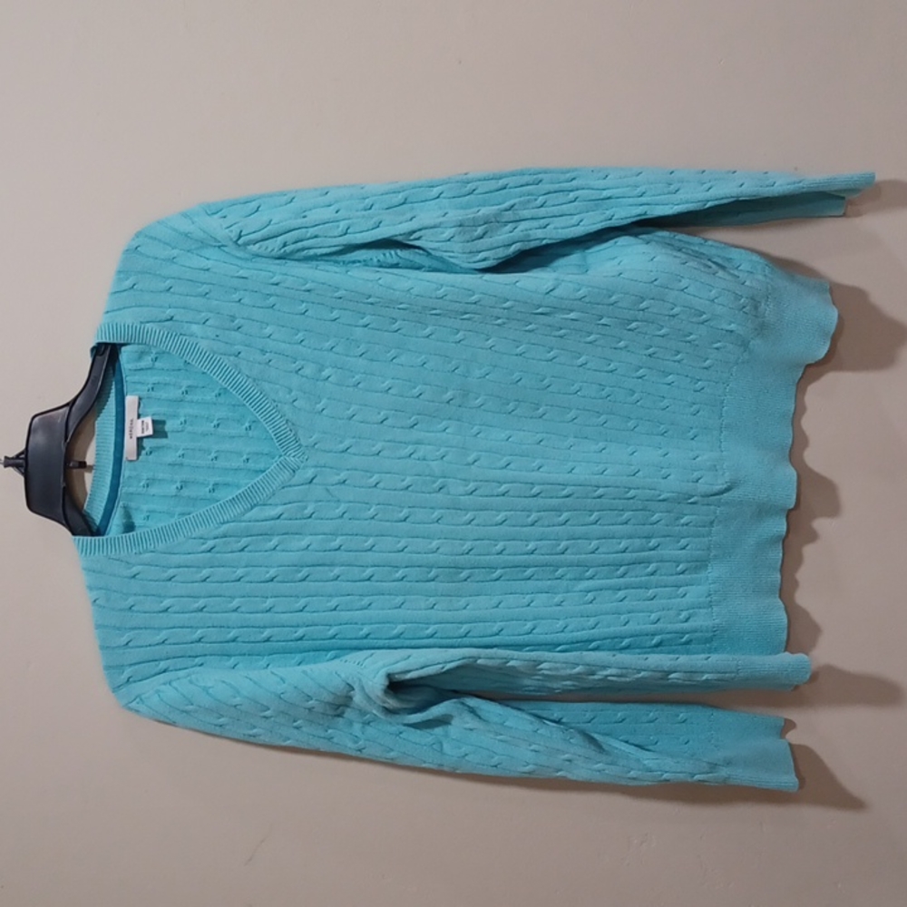Women's teal V-neck sweater